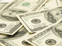 1030954_onehundreddollarspileasbackground._929556