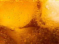 1038872_closeupviewoftheicecubesincolabackground_217447