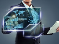 Businessman-with-tablet-computer-working-on-screen-over-virtual-background Distribution