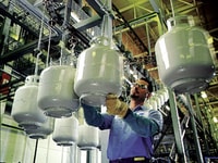 Cylinders being painted