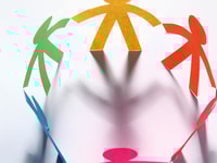 figures holding hands