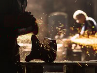 Industrial-Worker-at-the-factory-welding-closeup