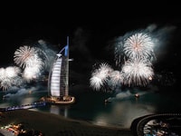 Fireworks light up the Burj Al Arab, from the Jumeirah Beach Hotel