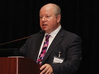John Raquet on stage in the Middle East