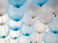 helium-White-and-blue-balloons-background