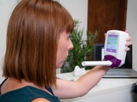Adult with NObreath FeNO monitor
