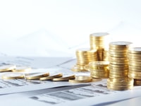 Business diagram on financial report with coins