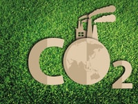 Carbon dioxide. Paper cut of eco on green grass