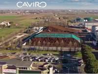 Caviro Extra, Faenza - Overview 01 with 2 large green storage of grapes and green residues.png