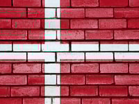 Denmark flag painted on brick wall