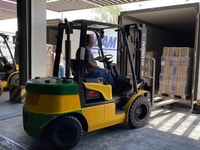 Loading_the_oxygen_concentrator_shipment_to_transporte_it_to_the_Ministry_of_Health_warehouses_to_be_used_in_Iraqi_hospitals