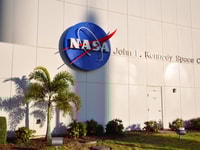 NASA FLORIDA, USA - DEC 20, 2010 NASA sign on the John F. Kennedy Space Center in Florida, USA._editoral use 680393935