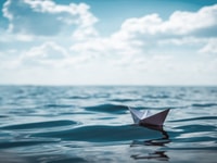 Paper Boat by the Sea