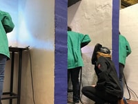 Samantha Farr is observing participants as they gas metal arc weld during an intensive training program_©2019 Women Who Weld®
