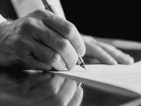 Signing contract close up