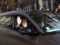 South Korean President Moon Jae-in waves his hand riding in Hyundai Motor`s hydrogen fuel cell car Nexo in Paris. [Photo provided by Blue House]