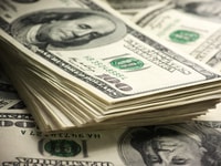Stack of one hundred dollar bills close-up_153178391