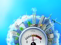 The concept of environmental pollution. City around a carbon dioxide sensor against a blue sky. The concept of safe energy