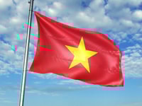Vietnam national flag waving in the blue sky realistic 3d illustration