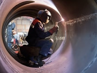 welder weld root weld from inside of the housing of chemical apparatus