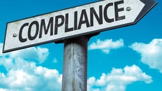 Compliance, sign with sky background