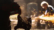 Industrial-Worker-at-the-factory-welding-closeup