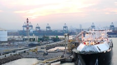 Liquefied natural gas LNG Tanker docked at Port