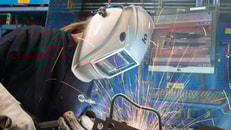 man welding