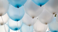 helium-White-and-blue-balloons-background