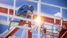 Workers-welding-steel-structures-with-lifter-and-hight-area