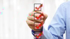 Compliance, businessman checking final mark on checklis