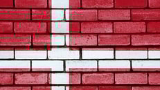 Denmark flag painted on brick wall