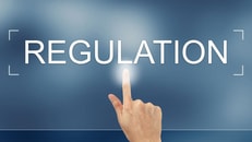 Compliance, hand press on regulation button on webpage