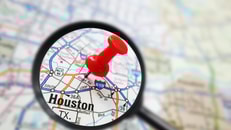 Houston, Texas map with red pin and magnifying glass