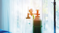 oxygen-tank-beside-patient-bed-in-hospital
