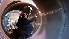 welder weld root weld from inside of the housing of chemical apparatus