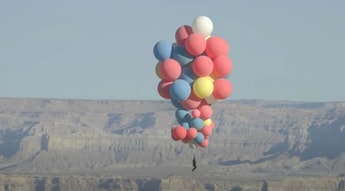 David Blaine flies over the Arizona Desert with helium balloons