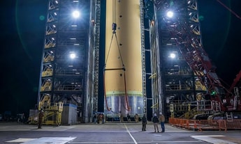 Space Launch System’s hydrogen tank loaded into test stand