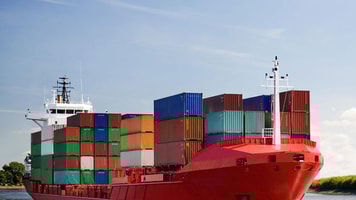 1028225_cargo-container-ship-freighter-navigating-river-Distribution