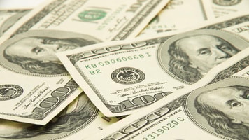 1029808_onehundreddollarspileasbackground._929556