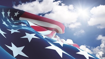 1030925_americanflagcloseuponbluesky_914161
