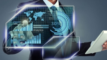 Businessman-with-tablet-computer-working-on-screen-over-virtual-background Distribution