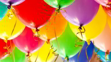Helium-Colorful-funny-balloons.-Background-low-depth-of-focus