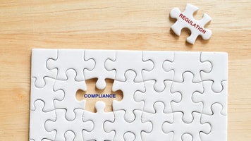 Compliance, Regulation words written on white jigsaw puzzle,business concept background