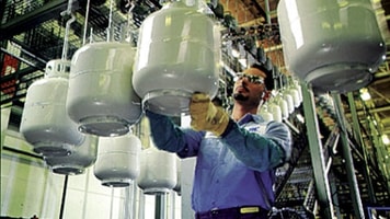 Cylinders being painted