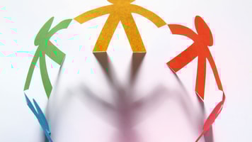 figures holding hands