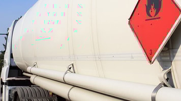 Flammable sign tanker safety distribution