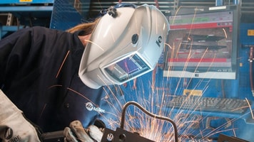 man welding