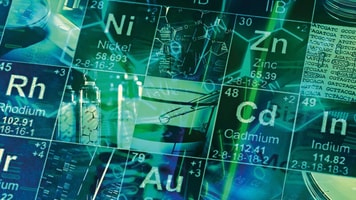 Spec-gases-Laboratory-Periodic-table-of-elements-and-laboratory-tools.-Science-concept-2
