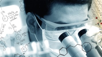 Spec-gases-Laboratory-chemist-using-microscope-to-analyze-the-sample-in-laboratory